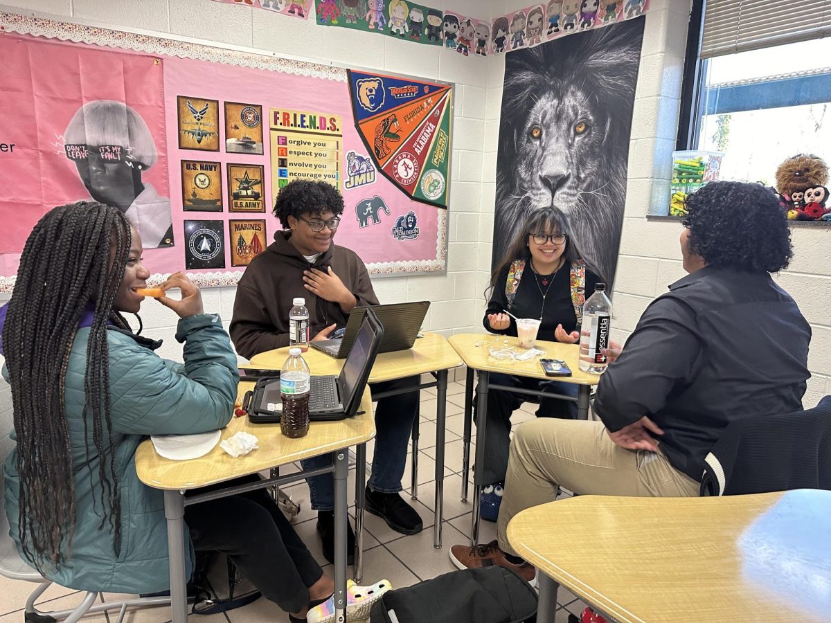 Students enjoy Lion Lunch in Ms. Hulatts classroom, A104.