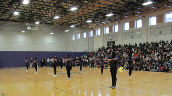 The Step Team performs at the Pep Rally.