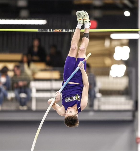 Landon Walker achieves a new personal record on the pole vault at fourteen feet.