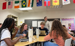 Journalism students diligently work.